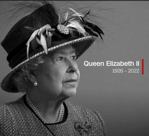 Black and White photo of the Queen with the words Queen Elizabeth II 1928-2022